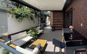 Caro Apartments & Rooms